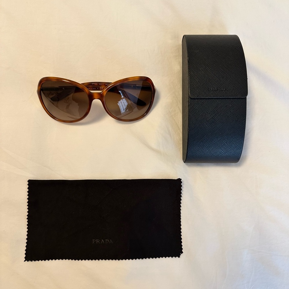 Prada SPR25L light brown/amber tortoiseshell sunglasses